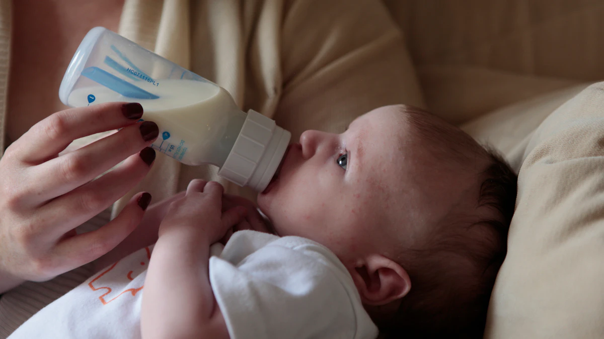 A countertop reverse osmosis water purifier next to baby formula bottles on a kitchen counter