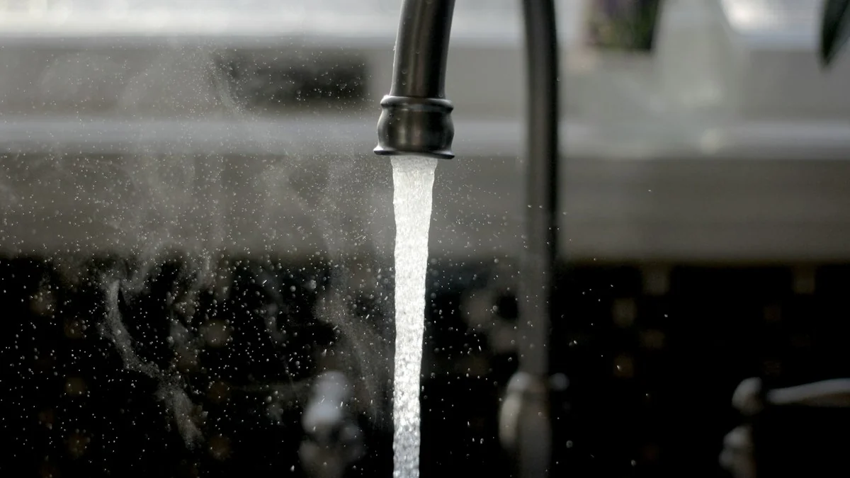 Water running from a dark kitchen faucet into a sink, the tap where iron staining and a sulfur smell show up first
